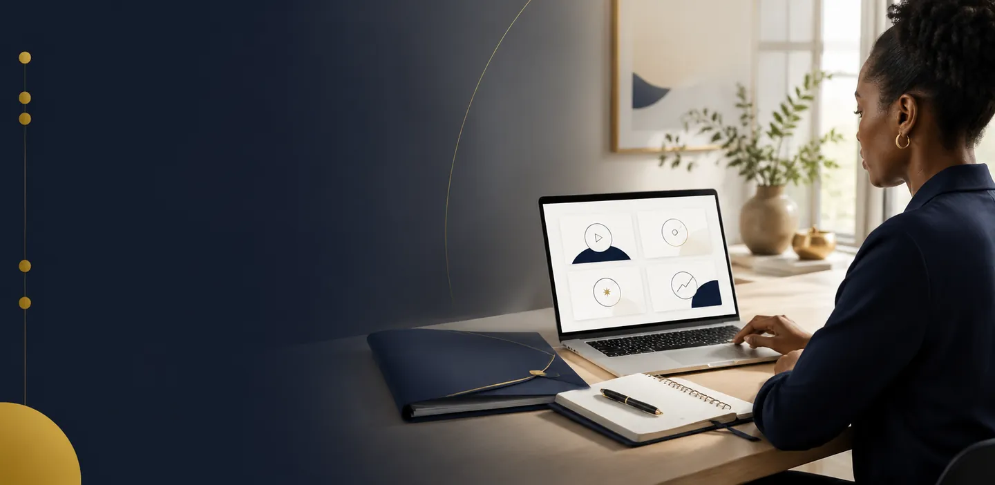 A member at a home desk opening her BORAKA workspace on a laptop